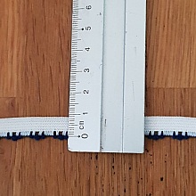 Au mètre Élastique blanc fantaisie 9 mm.