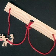 Casse-tete La vache, casse tete bois et ficelle fabrication artisanale