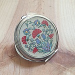 Miroir de sac enluminure fleurs orientales sur parchemin