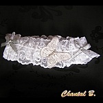jarretière mariage dentelle blanche et papillon d'argent