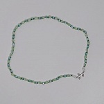 Ras du cou vert et rameau