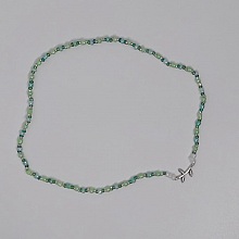Ras du cou vert et rameau